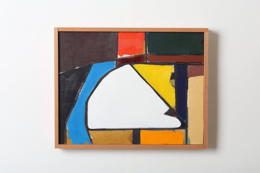 Abstract art piece with colorful geometric shapes in a wooden frame on a white background