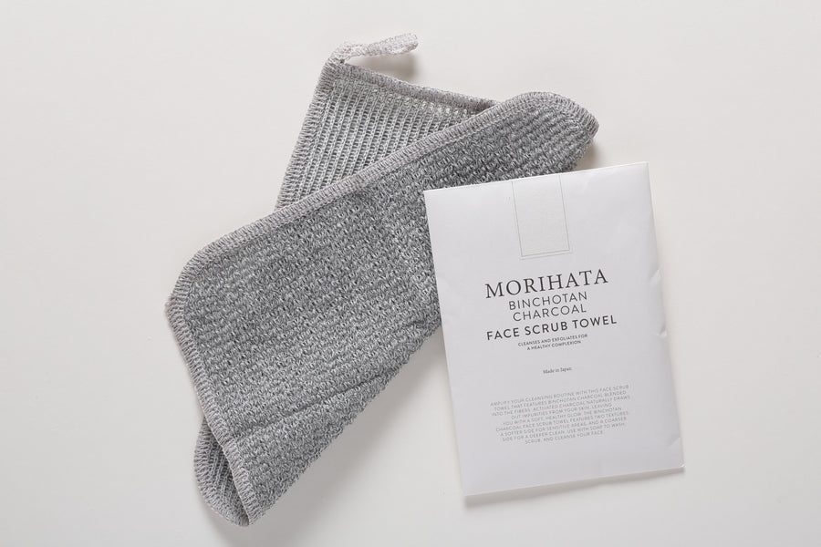 binchotan charcoal face scrub towel and packaging